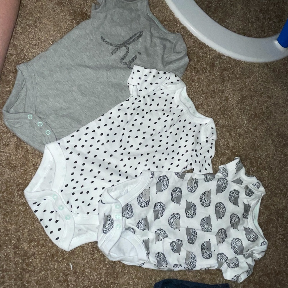 4 pack ( 1 not pictured dark grey) onesies